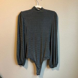 lightweight body suit,slight puffed sleeve,drop back,button neck, size M